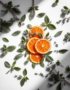 Orange and mint representing the olfactory notes of the perfume.