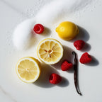 Sugar, lemon, raspberry and vanilla representing the olfactory notes of the perfume.